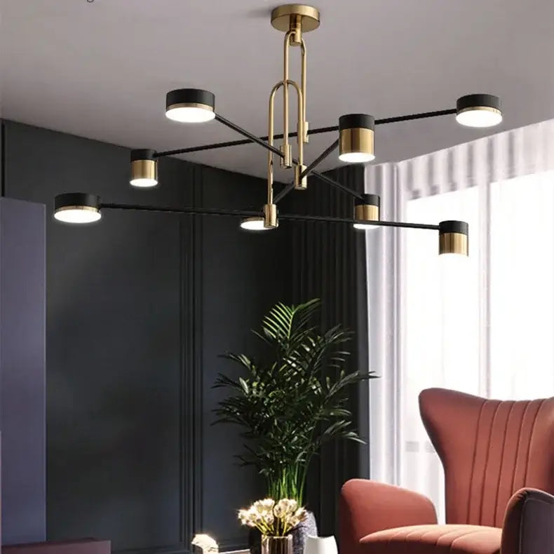Modern black and gold nordic pendant light with sleek geometric arms and brass fixture ideal for living room decor