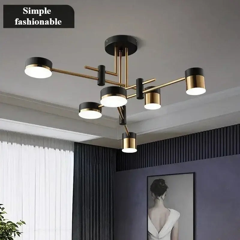 Modern black and gold geometric pendant light with cylindrical fixtures ideal for nordic black gold living room decor