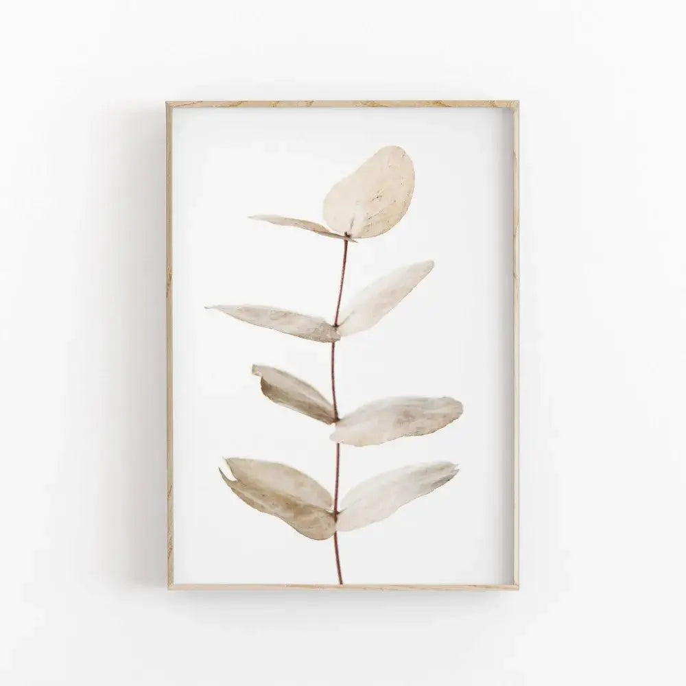 Minimalist framed decorbites™ nordic botanical poster canvas art featuring eucalyptus branch in beige and muted brown tones