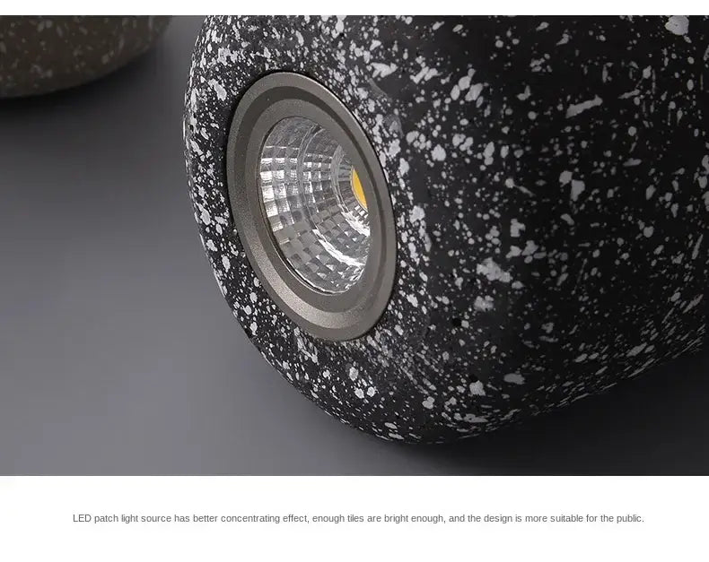 DecorBites™ Nordic cement pendant lamp with black speckled concrete led patch and metallic circular frame in industrial style