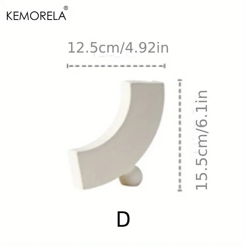 Off-white Kemorela ceramic decorative shelf bracket with curved design and rounded base for nordic ceramic vase display