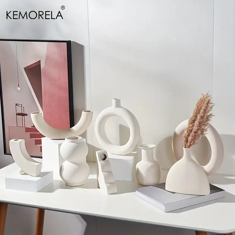 Minimalist white nordic ceramic vase with abstract geometric shapes and smooth matte finish decorbites™ home decor accent