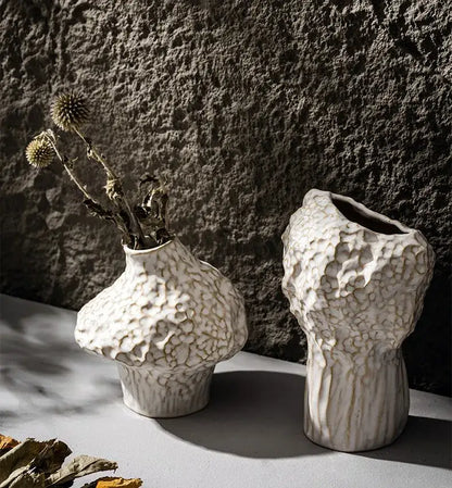 Two off-white nordic ceramic vases with textured organic surfaces in the DecorBites™ nordic ceramic vase with pampas grass set