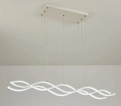 Modern white led pendant light with sleek wave design and transparent cords for dining room decor by DecorBites™ Nordic Chandeliers
