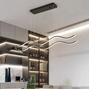 Modern minimalist DecorBites nordic chandeliers with wave-shaped led pendant lights in brushed metal for dining room lighting