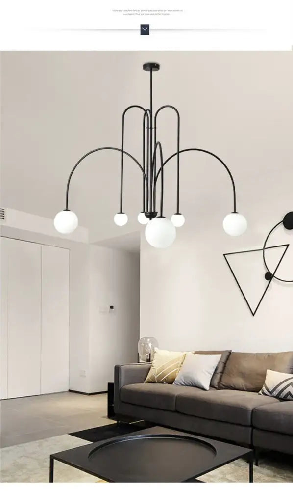 Black metal comet chandelier nordic with multiple curved arms and white glass globe lights for elegant home décor