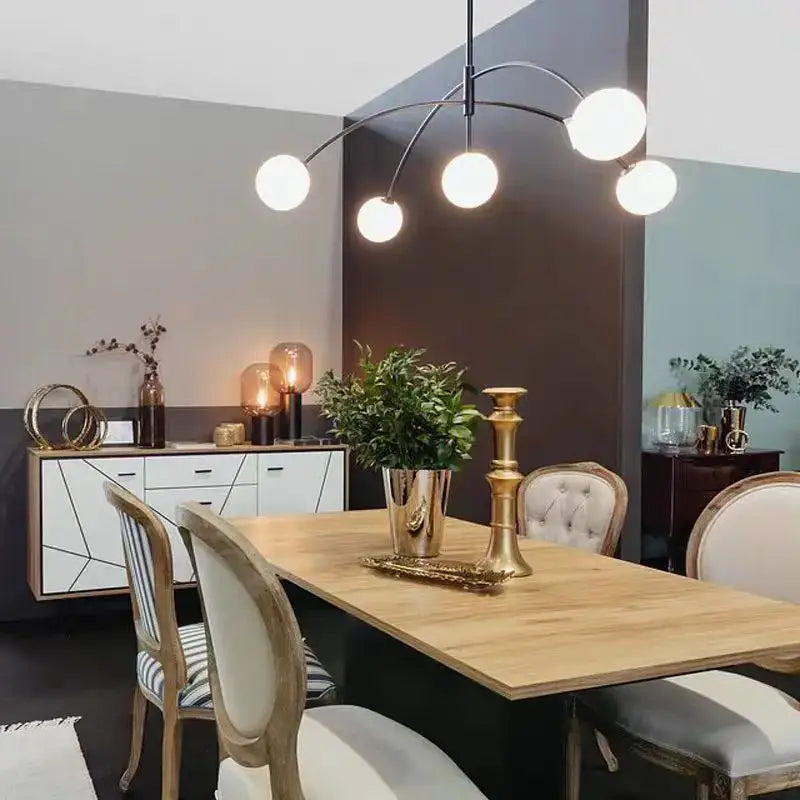 Modern black metal comet chandelier nordic with five white glass globe lights for elegant home décor