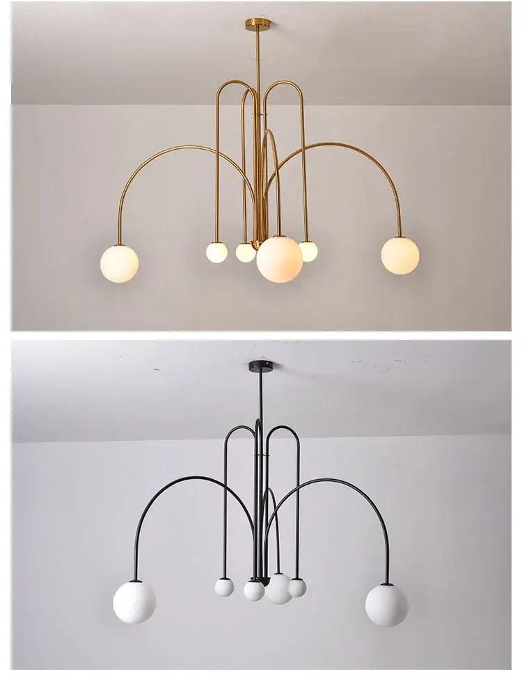 Modern brass and white globe comet chandelier nordic with curved arches for elegant home décor by DecorBites