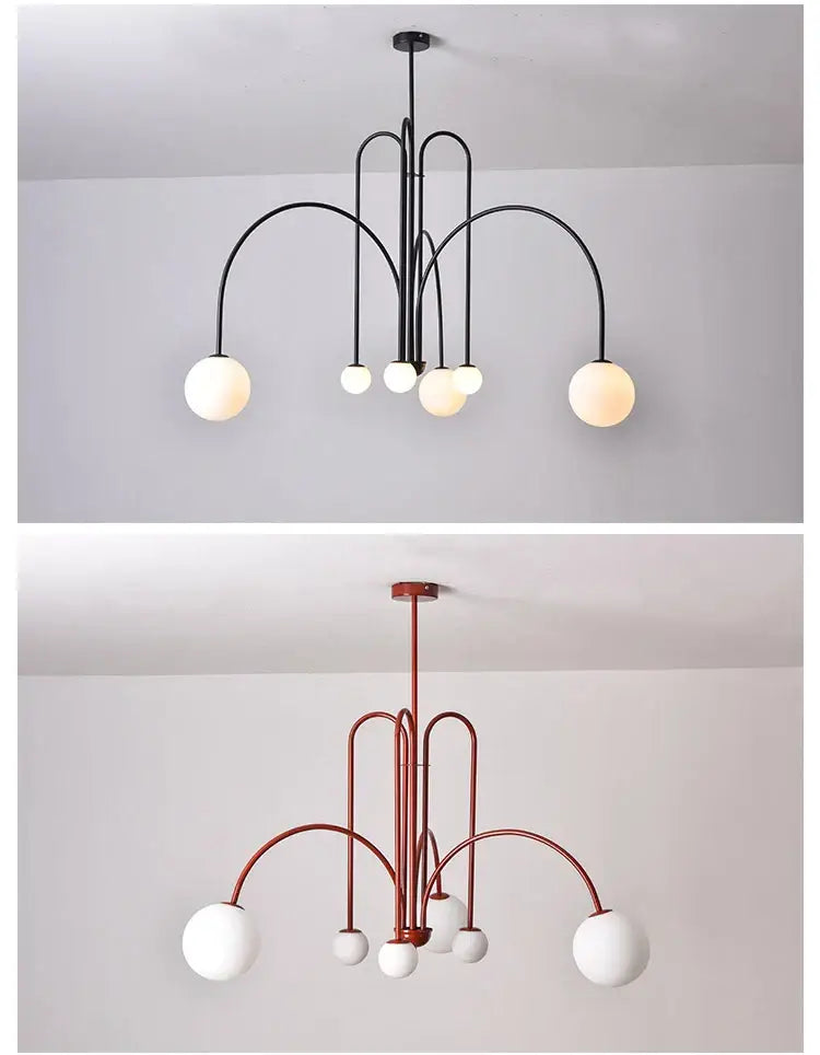 Modern black metal comet chandelier nordic with curved arms and spherical glass globes for elegant home décor