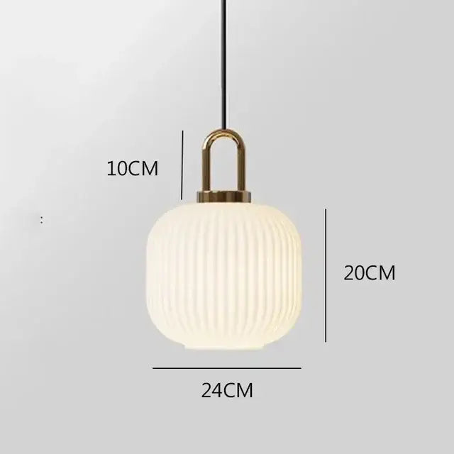 Cream-colored ribbed glass pendant light with brass metal fixture complementing decorbites nordic deer head wall lamp