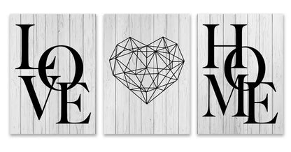 Set of three black and white rustic wood canvas prints featuring love home and nordic diamond heart design by decorbites