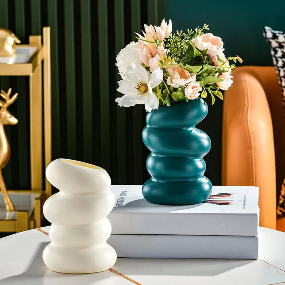 Teal ceramic nordic flower vase with segmented wavy design ideal for modern home decor by DecorBites