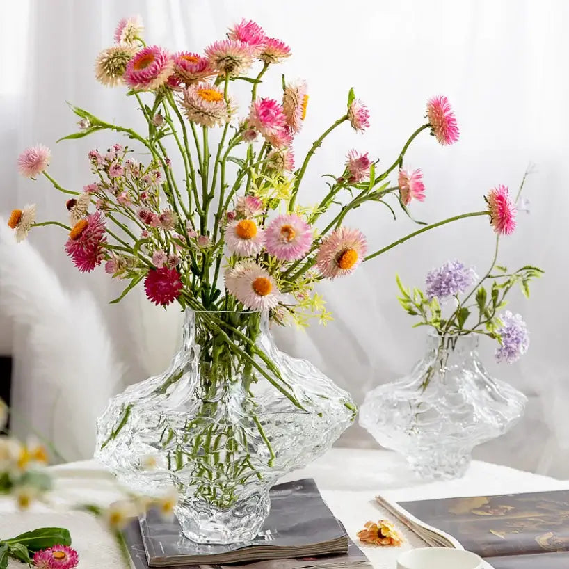 Decorbites™ nordic frosting glass vase is a clear textured frosting glass vase holding vibrant pink and white flowers