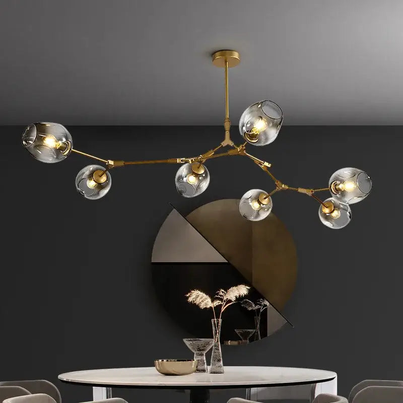 Gold-toned decorbites nordic glass ball led chandelier with clear glass globe shades in black and gold finish