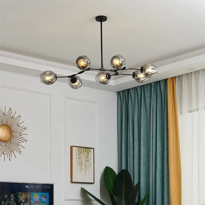 Modern black metal nordic glass ball led chandelier featuring multiple spherical glass globe lights in black gold finish