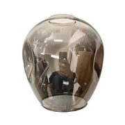 A sleek translucent amber glass ball vase with smooth reflective surface for decorbites nordic glass ball led chandelier