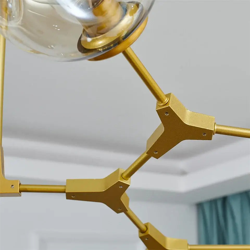 Gold-toned nordic glass ball led chandelier with clear glass globe fixtures in the DecorBites™ black gold design