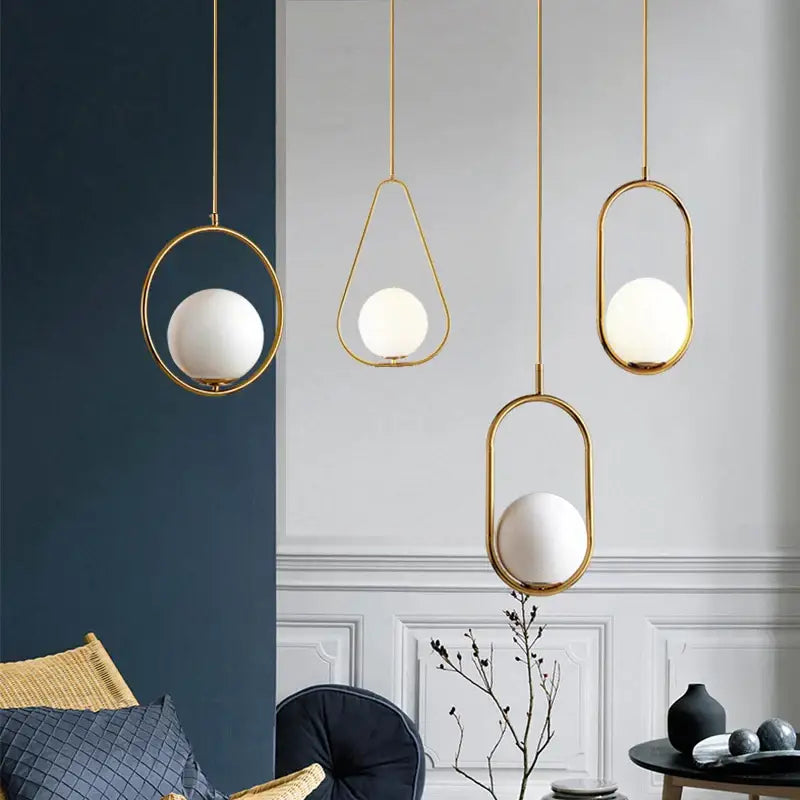 DecorBites™ nordic glass ball pendant light with gold-toned frame and frosted glass ball light source