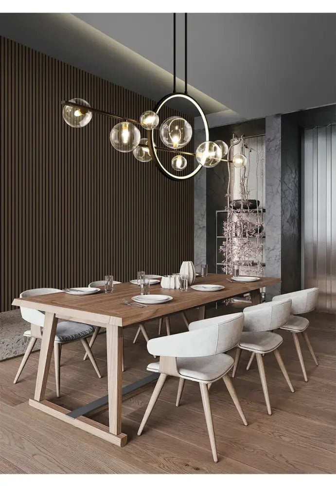 Modern glass globe chandelier with sleek metallic frame in black featuring nordic glass bubble led design by decorbites