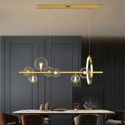 Modern gold-toned DecorBites™ nordic glass bubble LED chandelier with clear glass globe bulbs and circular accent piece