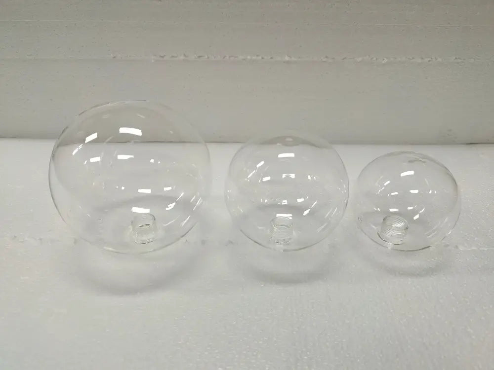 Three clear glass bubble globes of varying sizes with threaded bases for decorbites™ nordic glass bubble led chandelier black