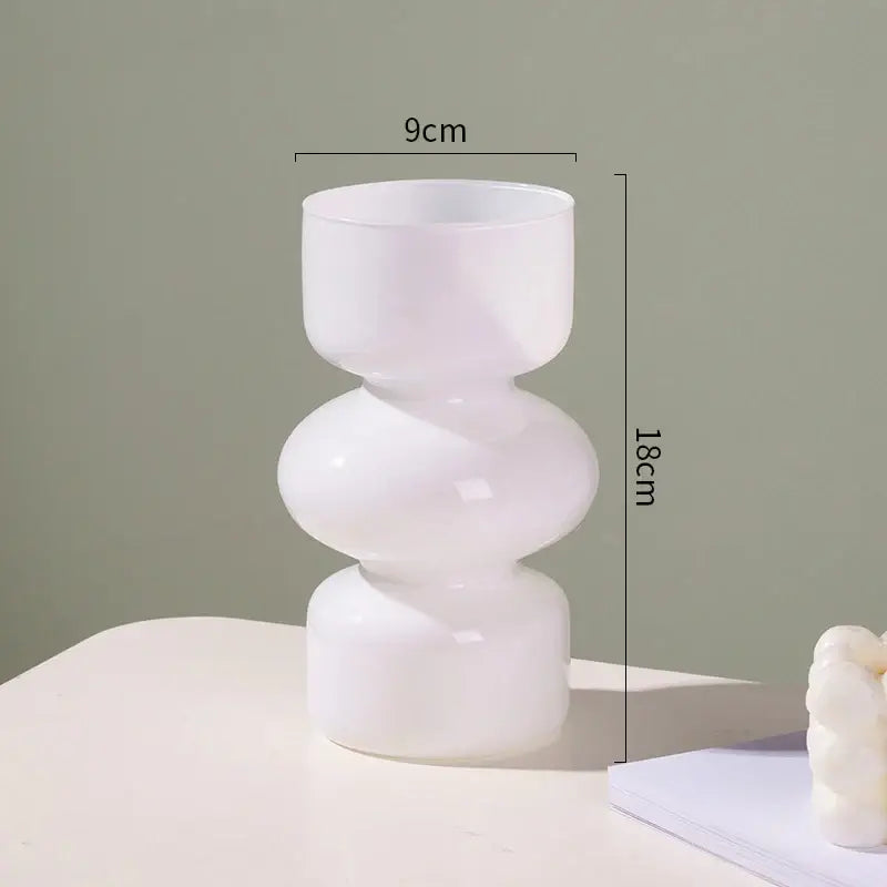 A sleek frosted white glass vase with a modern stacked geometric design for vase home decor by decorbites™
