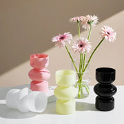 A sleek glossy black glass vase with stacked rounded segments for vase home decor by decorbites nordic collection