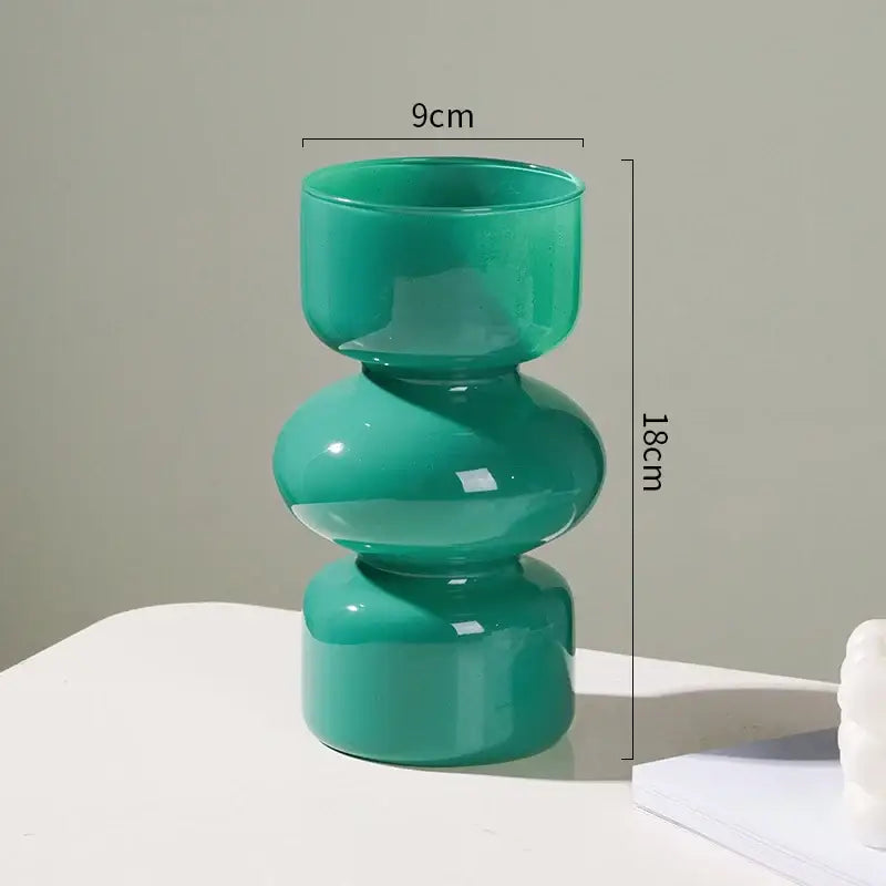 DecorBites™ nordic glass vase home decor in translucent teal with a modern stacked rounded segment design