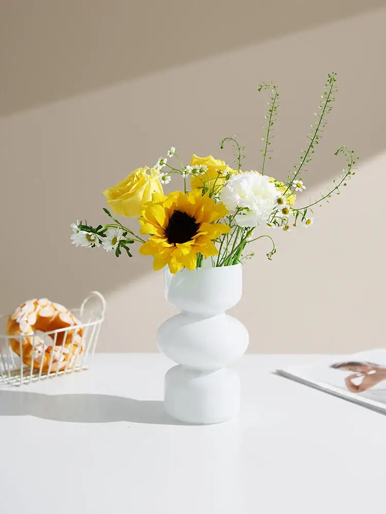 DecorBites™ nordic glass vase home decor with white ceramic stacked tiers holding yellow roses and sunflowers