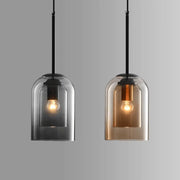 Two modern glass pendant lights with clear domes and black metal frames from decorbites nordic glass pendant lighting