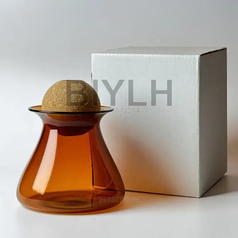 Amber-colored DecorBites Nordic glass vase with textured cork stopper for elegant home decor and small vase use