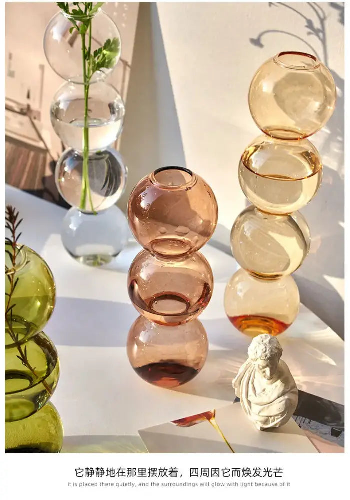 Stacked decorbites™ nordic glass vases in gradient amber and rose hues with smooth translucent finish for home decoration