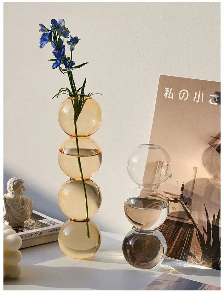 DecorBites™ nordic glass vase tall amber glass vase with stacked spheres holding single blue flower home decoration gift