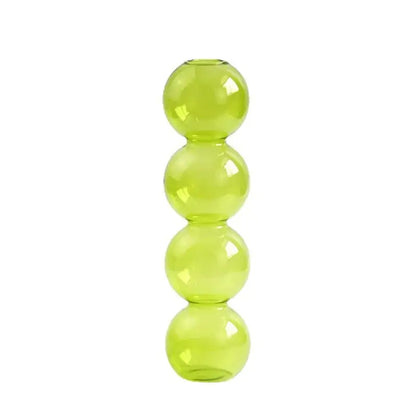 DecorBites nordic glass vase in translucent lime green with four stacked spherical segments for home decoration