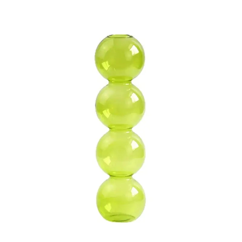 DecorBites nordic glass vase in translucent lime green with four stacked spherical segments for home decoration