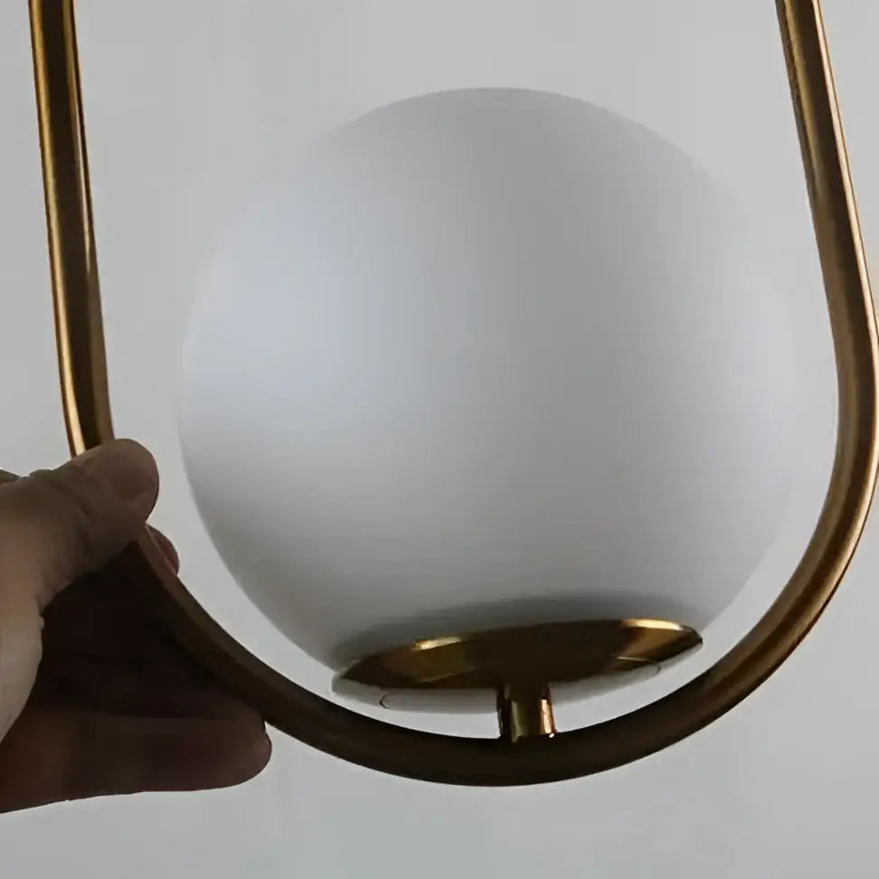 DecorBites™ nordic gold pendant light with frosted white glass shade and elegant gold-toned metal arms