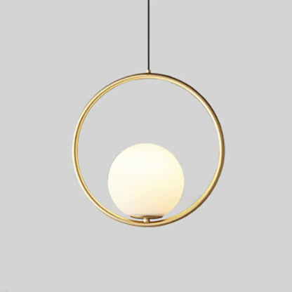 Gold-toned nordic gold pendant light with a circular frame and frosted glass shade by DecorBites pendant light