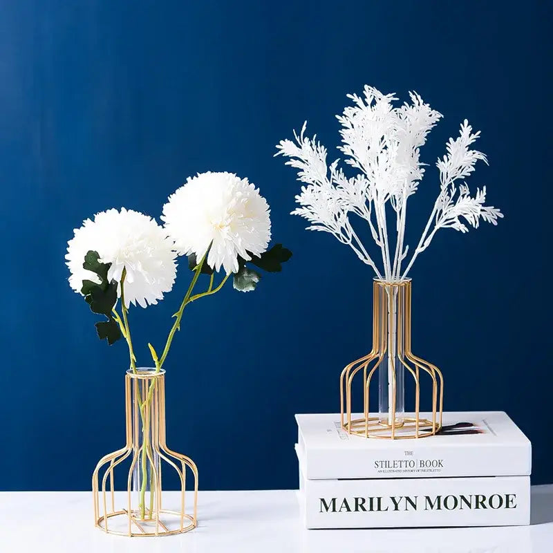 Gold wireframe glass vases holding white artificial flowers from DecorBites™ nordic golden iron hydroponic table vase collection
