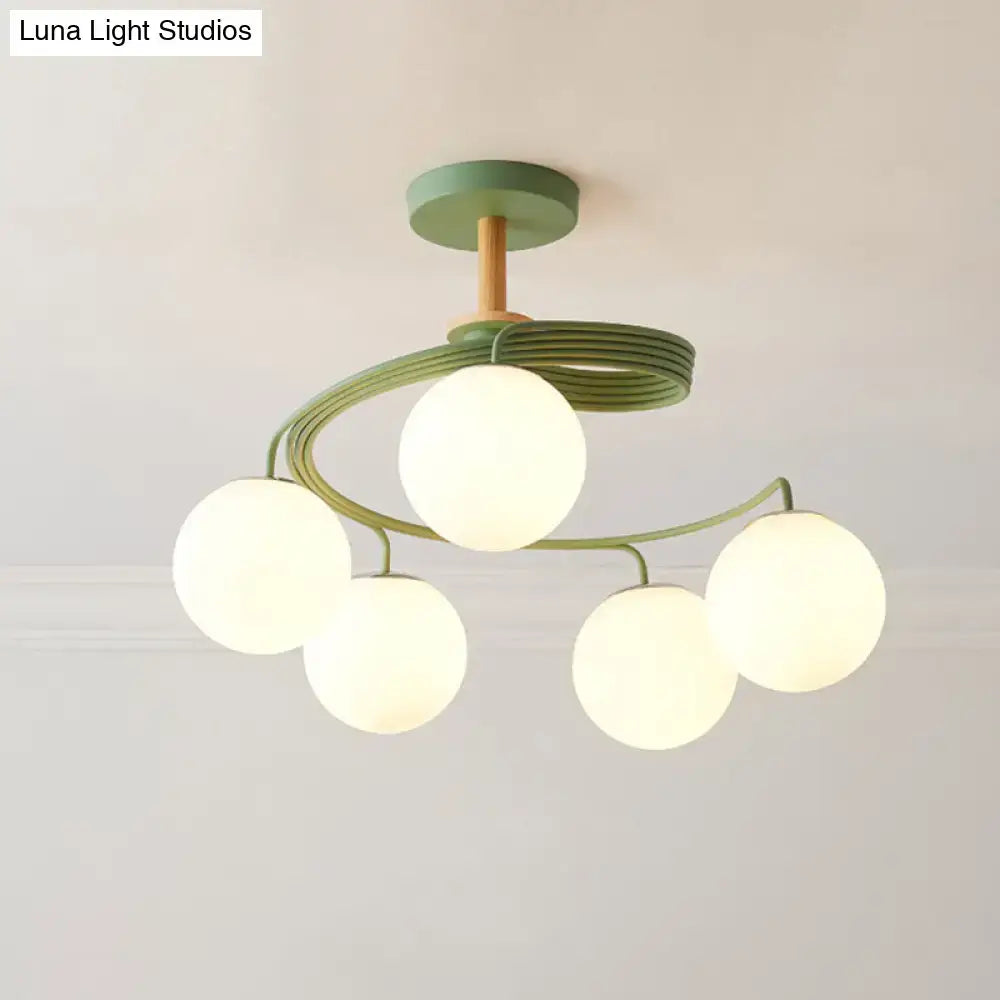 Modern green and wood-toned decorbites nordic iron swirl flush chandelier with five orb glass shade bulbs in spiral design