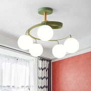 DecorBites Nordic iron swirl flush chandelier with five orb glass shades on green metal frame and wooden downrod