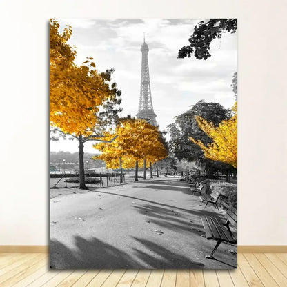 A framed DecorBites™ nordic landscape canvas print featuring black and white Eiffel Tower with yellow autumn trees