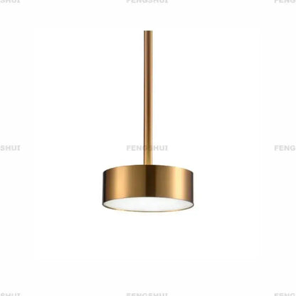 A sleek cylindrical nordic led bubble pendant light with brushed gold finish and frosted glass diffuser by decorbites