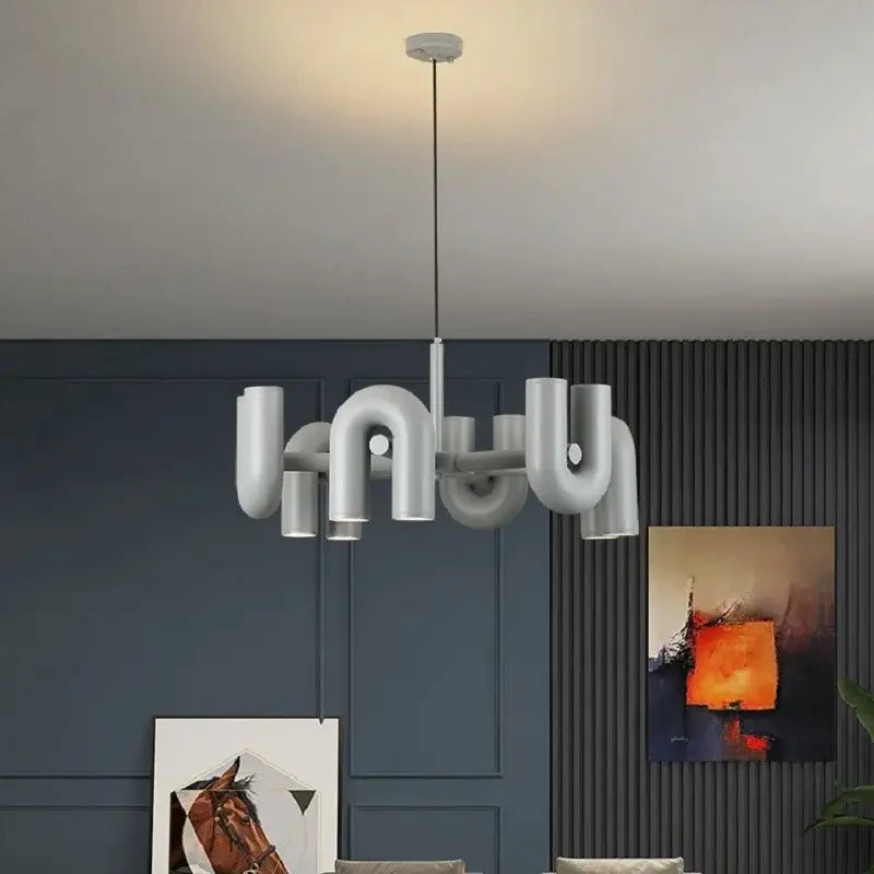 Modern white pipe chandelier with curved nordic u shape segments for living room home decor by decorbites