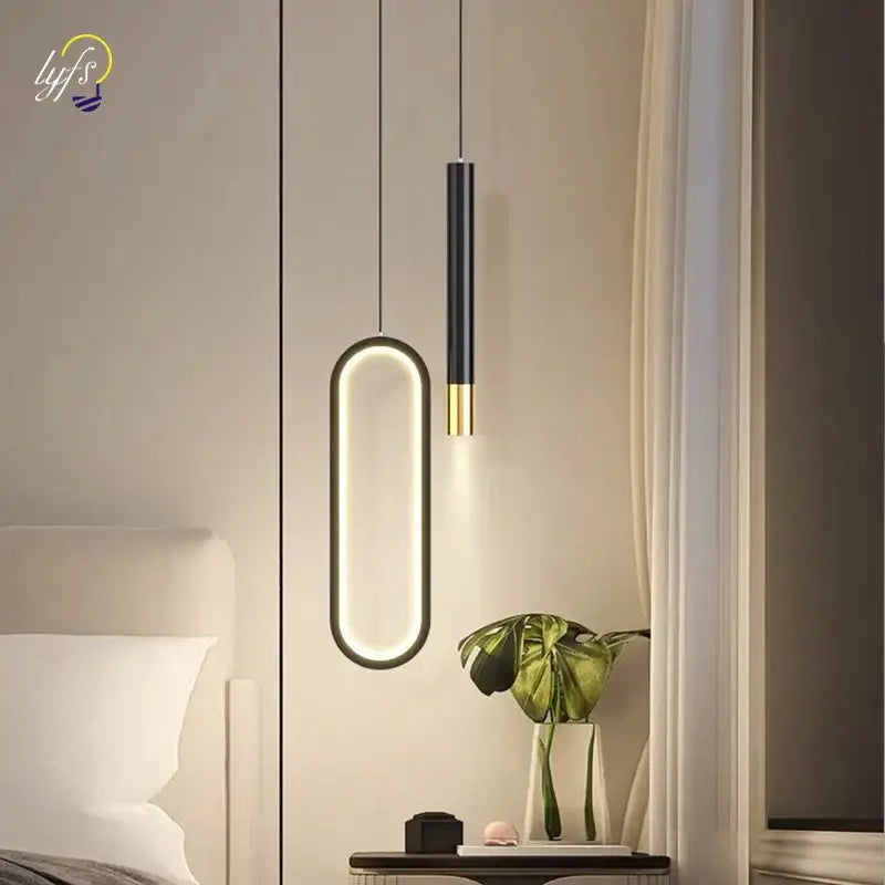 Modern black and gold decorbites nordic led pendant light with sleek elongated oval design for home decoration