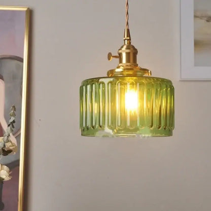 DecorBites™ Nordic led pendant light with green ribbed glass shade and brass hardware hanging from chain cord