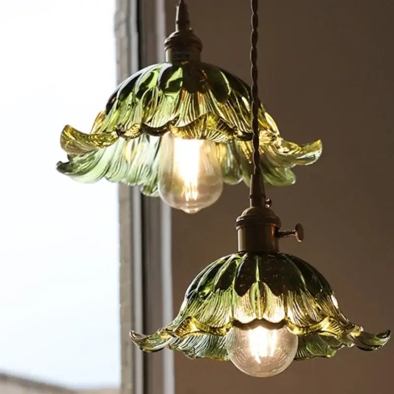 DecorBites™ nordic led pendant light with green glass leaf-shaped shades and brass fixtures hanging by chain cord