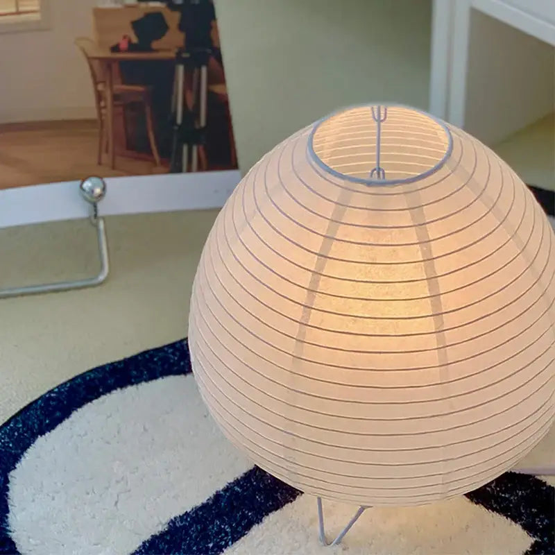 DecorBites Nordic cream paper led table lamp with spherical shape and subtle ridges for bedroom and study lighting