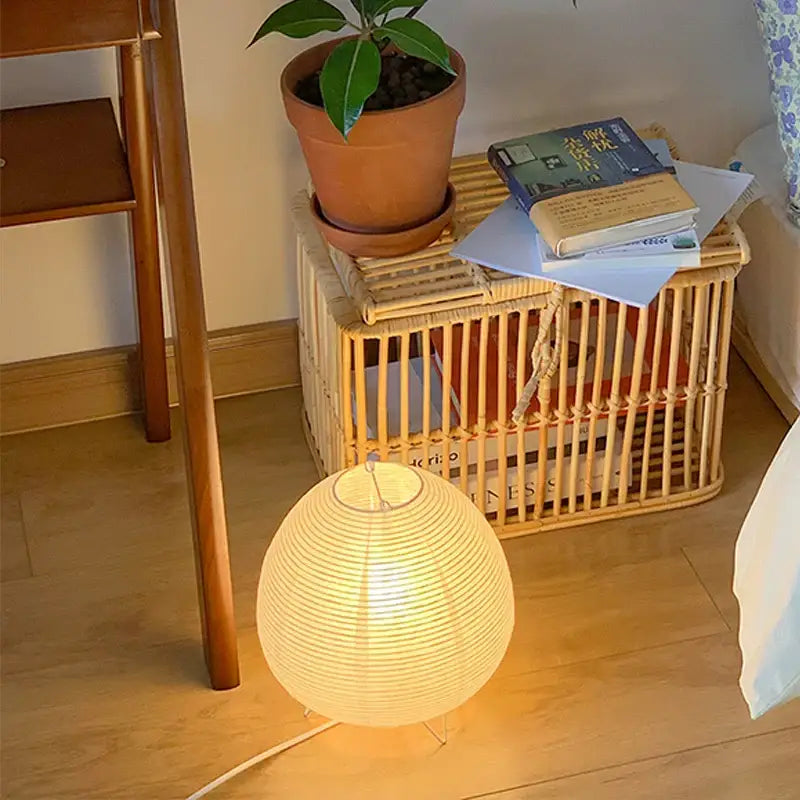Decorbites nordic led table lamp with spherical ribbed paper shade emitting warm diffused light for home decor