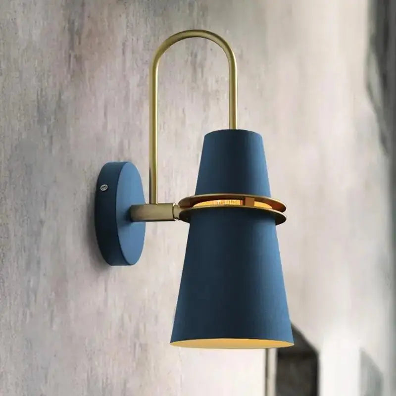 DecorBites™ Nordic minimalist wall lamp with blue conical design, brass accents, and warm interior glow wall lamp