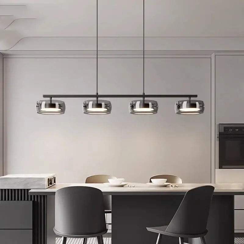 DecorBites™ nordic pendant lamp with modern black metal frame and four reflective glass globe shades for warm white lighting